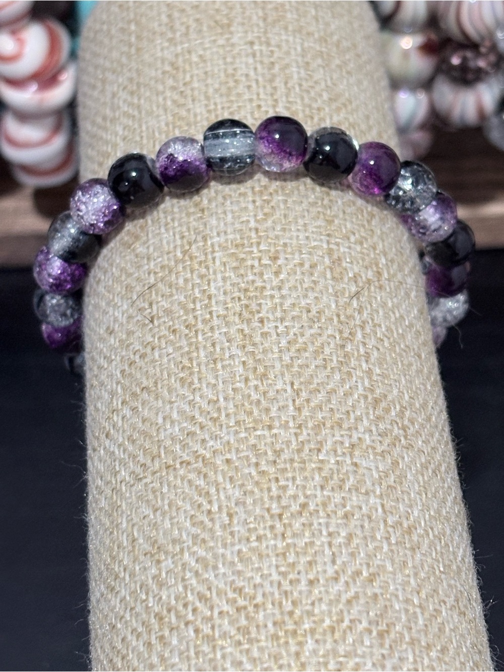 Handcrafted purple and black glass beaded bracelet